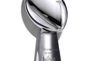 Trophy-ul simbolic al NFL: Povestea din spatele trofeului Vince Lombardi Când echipa New England Patriots va păși pe teren pentru Super Bowl LX pe 8 februarie în Santa Clara, California, va avea ocazia de a revendica din nou trofeul Vince Lombardi