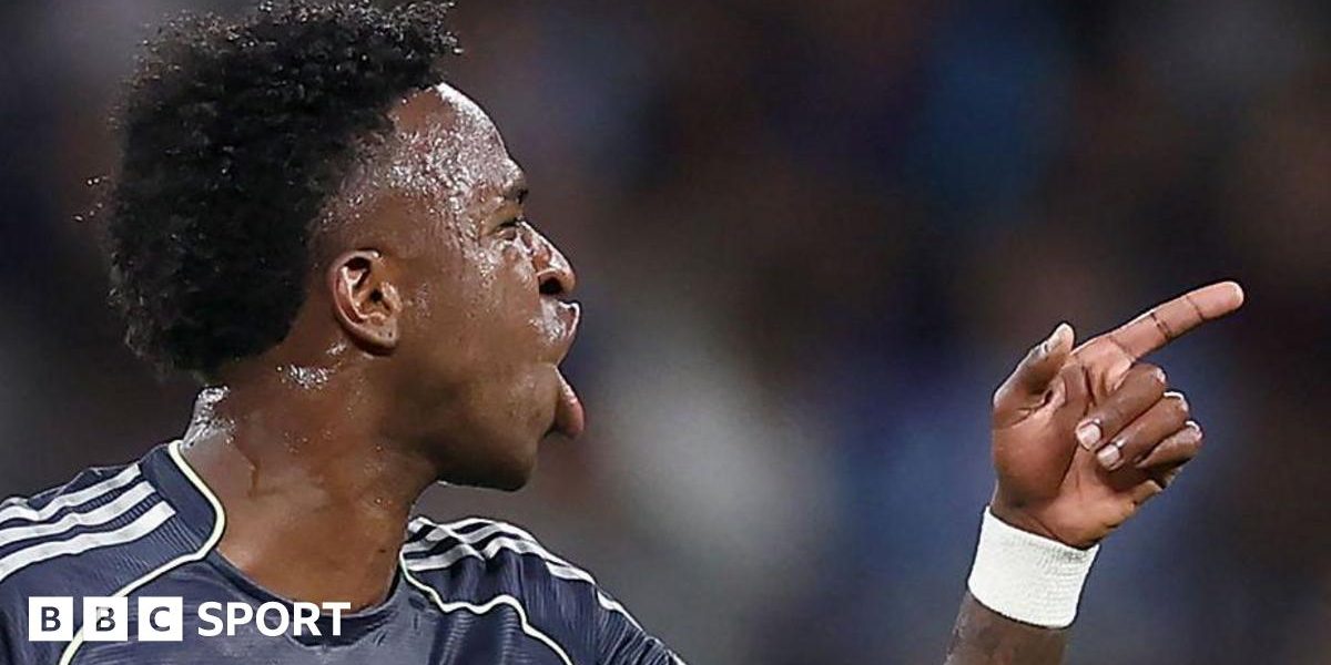 Vinicius Jr and Real Madrid players celebrate
