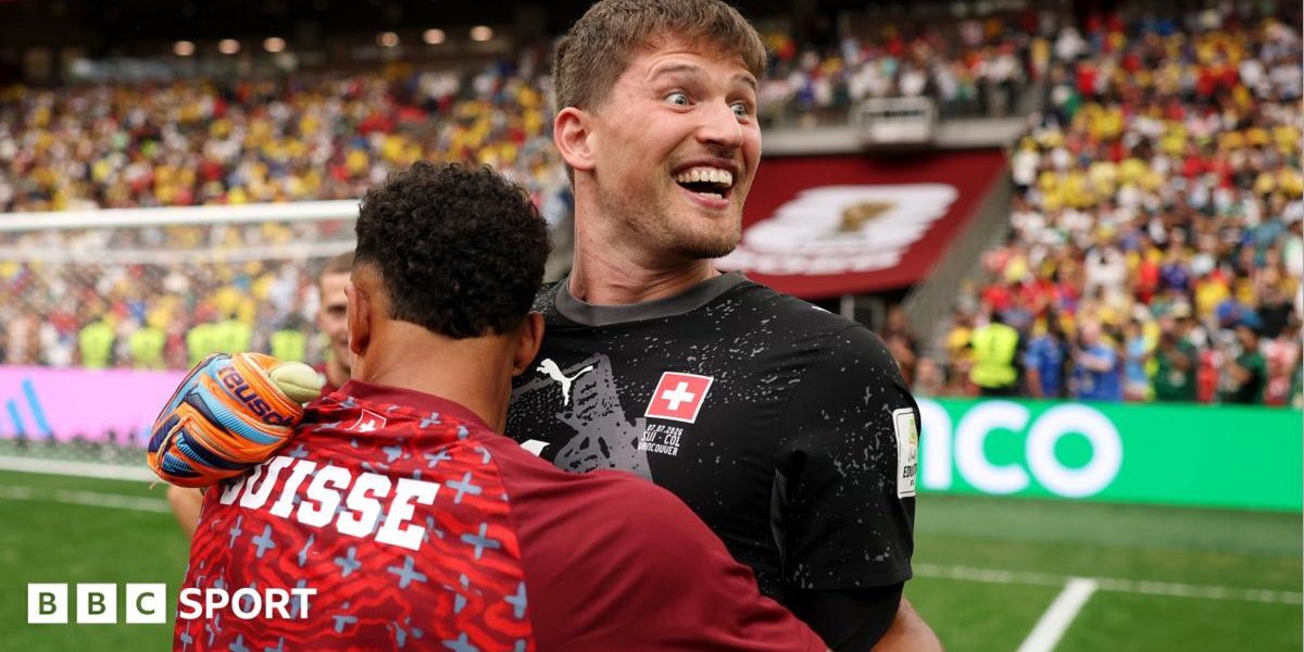 Gregor Kobel celebrates after Switzerland shootout win over Colombia